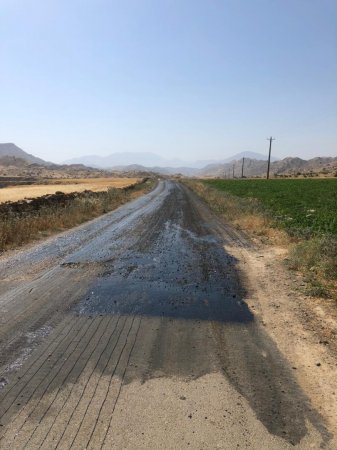 آغاز عملیات روکش آسفالت جاده ارتباطی روستای بلربیشه شهرستان کهگیلویه+تصاویر